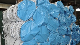 Seafreight packing in fully wrapped bundles.JPG